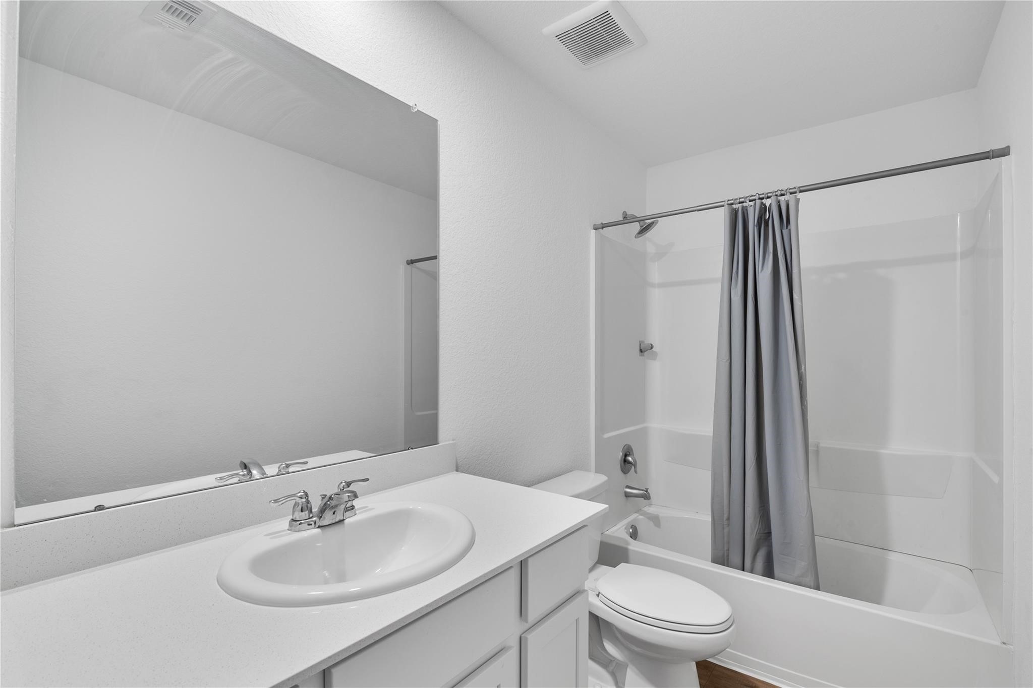 3034 Twisted Myrtle Drive Conroe, TX 77301 - Photo 21 of 27 a bathroom with a sink toilet and shower