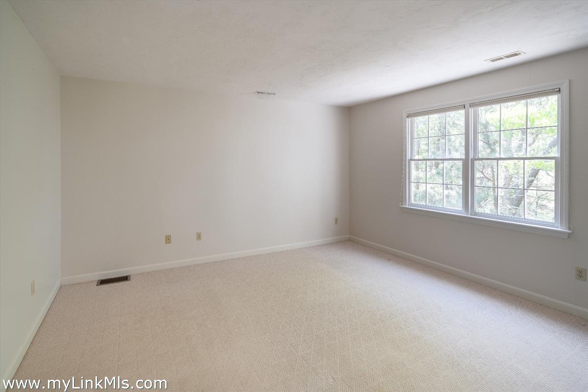 261 Sandpiper Lane, Unit 12 Vineyard Haven, MA 02568 - Photo 19 of 50 an empty room with a window