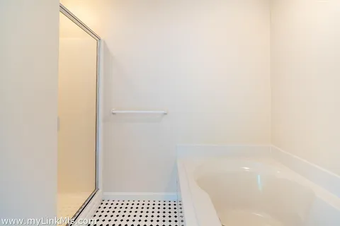a bathroom with a bathtub