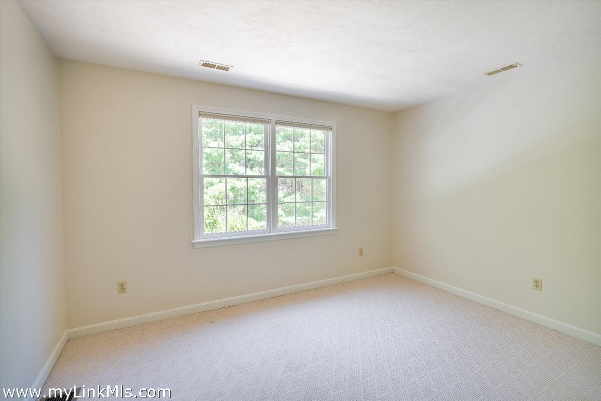 261 Sandpiper Lane, Unit 12 Vineyard Haven, MA 02568 - Photo 27 of 50 an empty room with a window