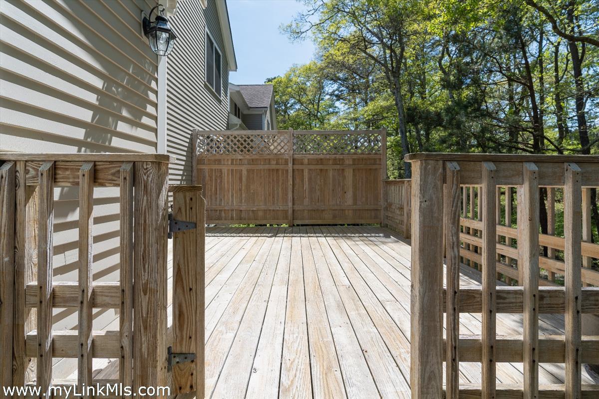 261 Sandpiper Lane, Unit 12 Vineyard Haven, MA 02568 - Photo 33 of 50 a view of backyard with a deck
