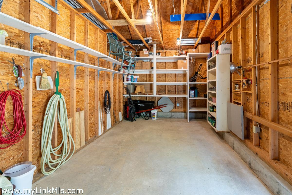 261 Sandpiper Lane, Unit 12 Vineyard Haven, MA 02568 - Photo 35 of 50 a view of walk in closet with clothes and shoes