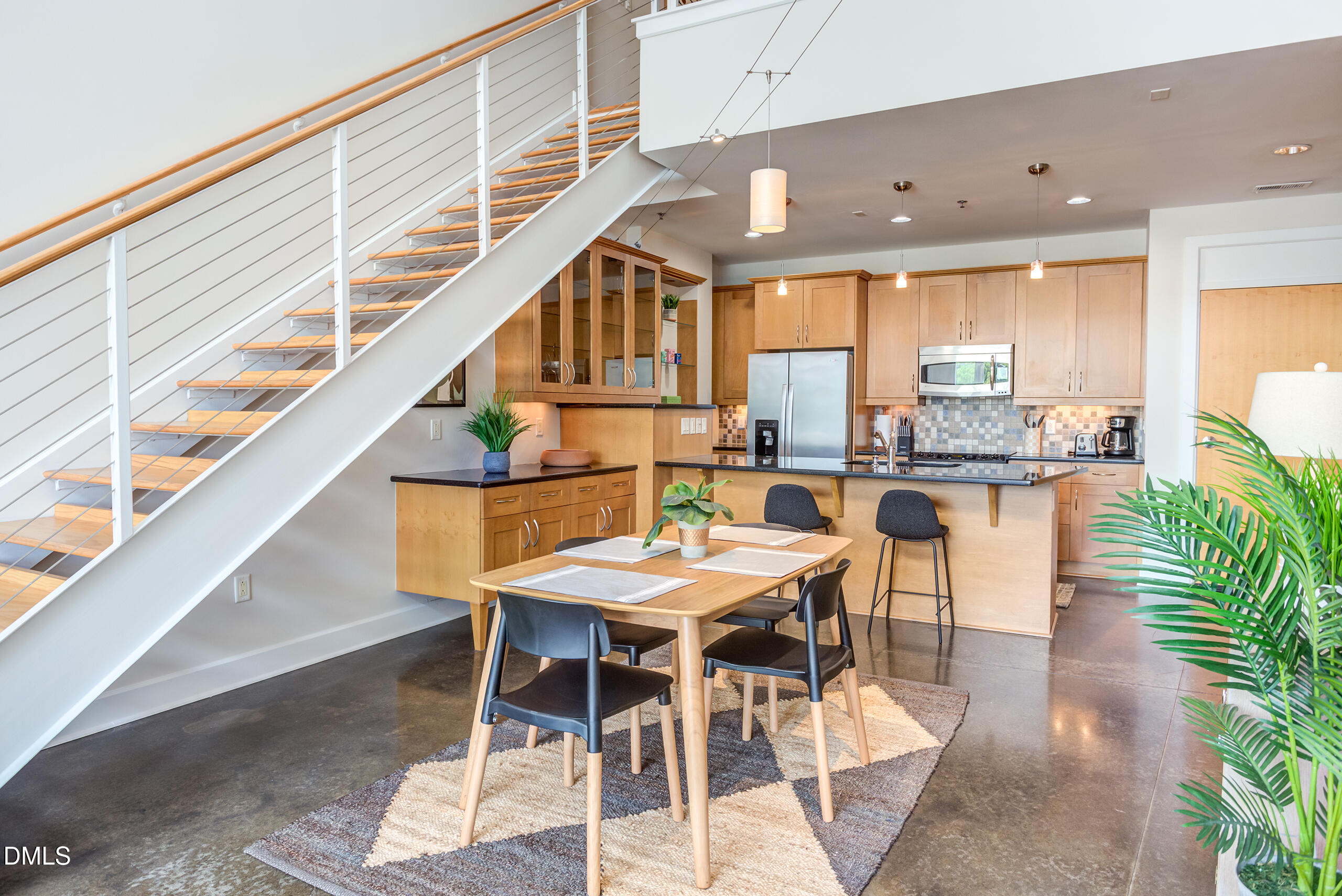 2608 Erwin Road, Unit 417 Durham, NC 27705 - Photo 14 of 50 a dining room with furniture and a floor to ceiling window