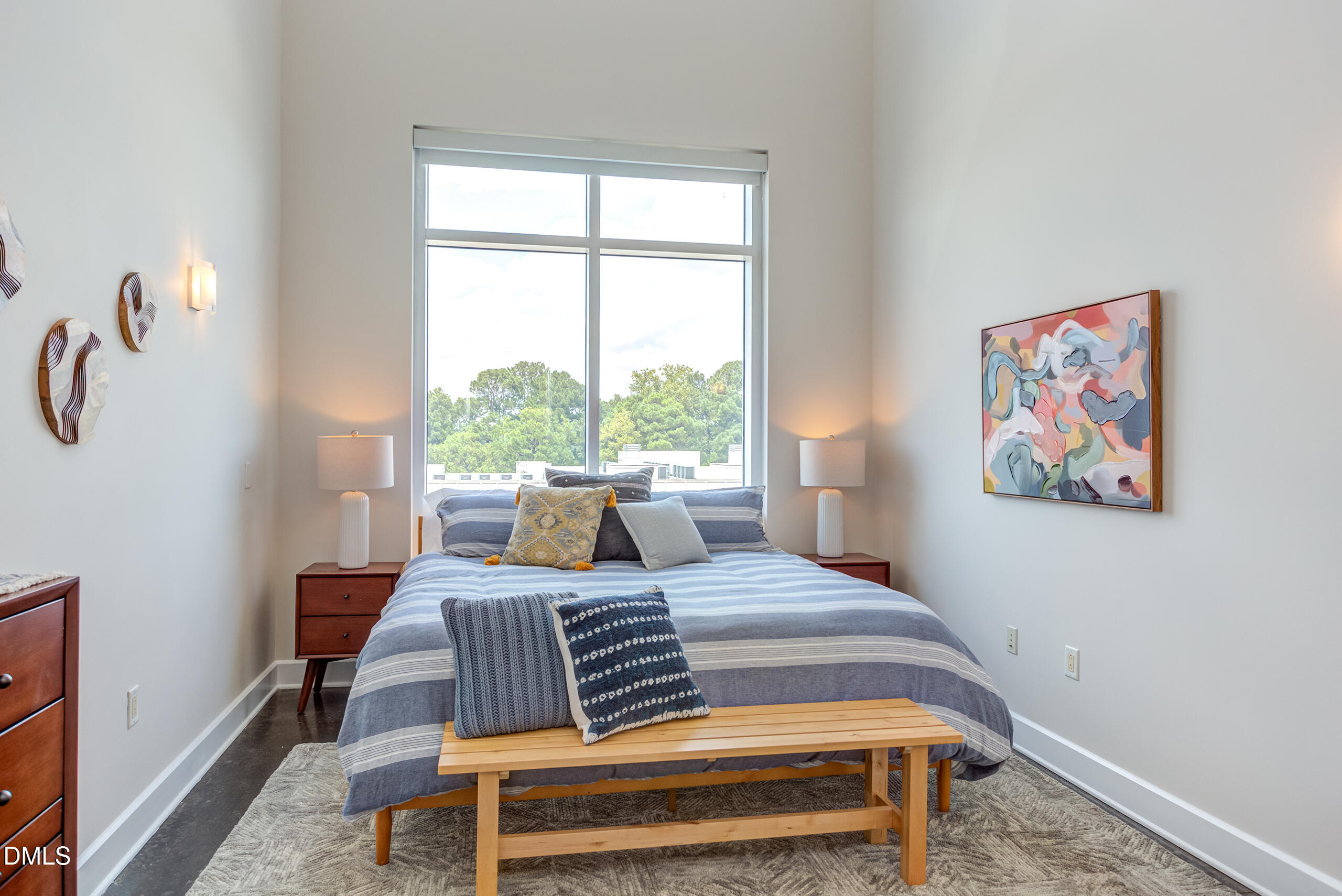 2608 Erwin Road, Unit 417 Durham, NC 27705 - Photo 23 of 50 a bedroom with a bed and glass window