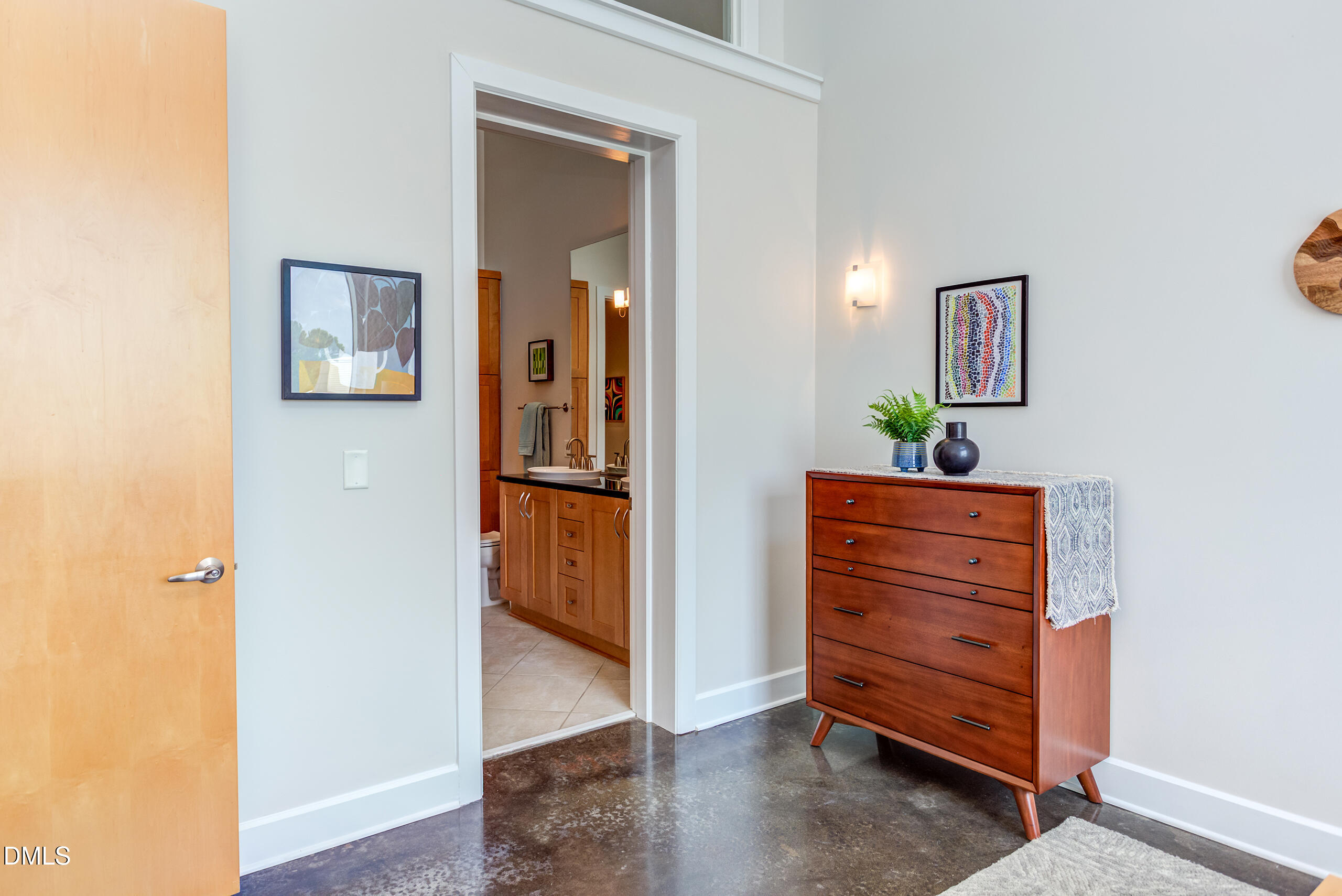 2608 Erwin Road, Unit 417 Durham, NC 27705 - Photo 24 of 50 a view of a hallway with wooden floor and furniture