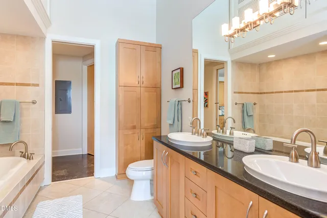 a bathroom with a sink a toilet and a bathtub