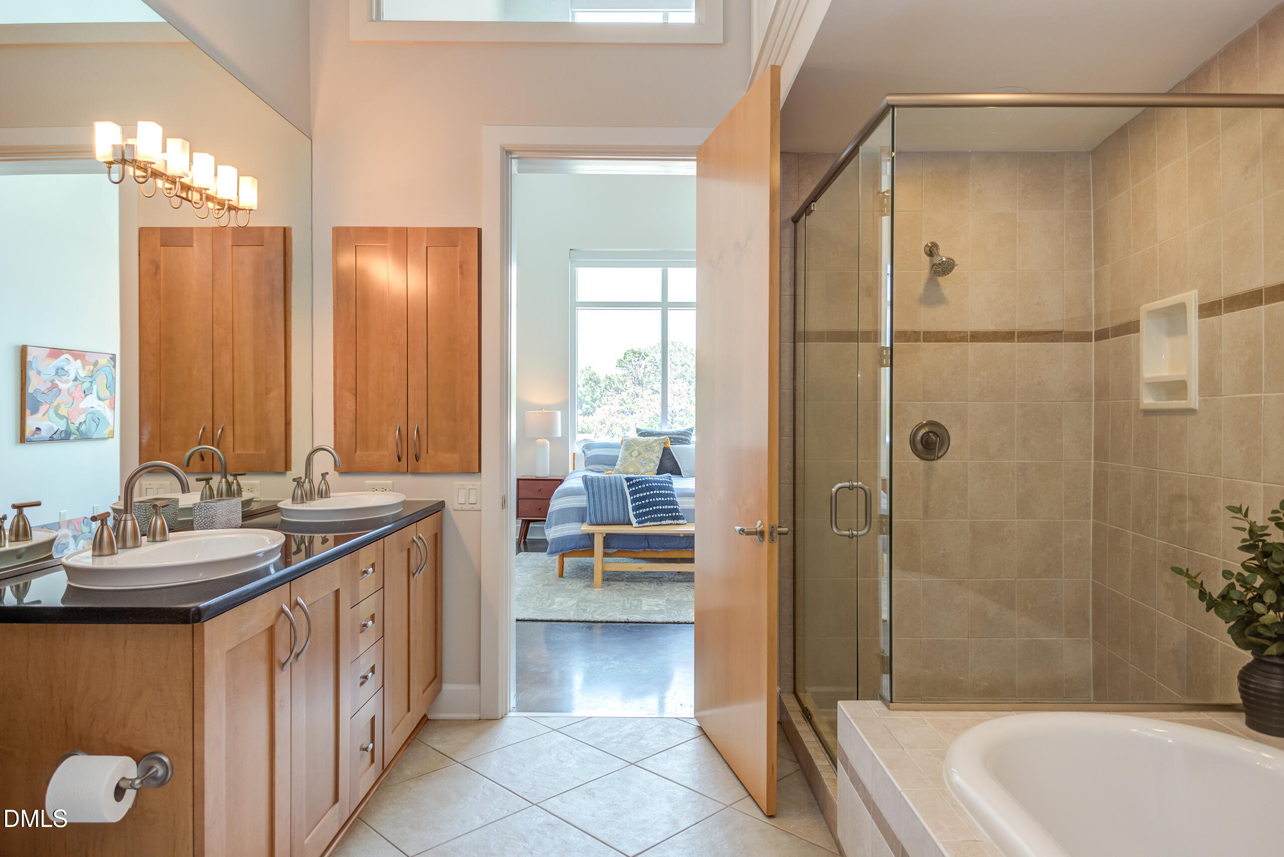 2608 Erwin Road, Unit 417 Durham, NC 27705 - Photo 27 of 50 a bathroom with a double vanity sink toilet and shower