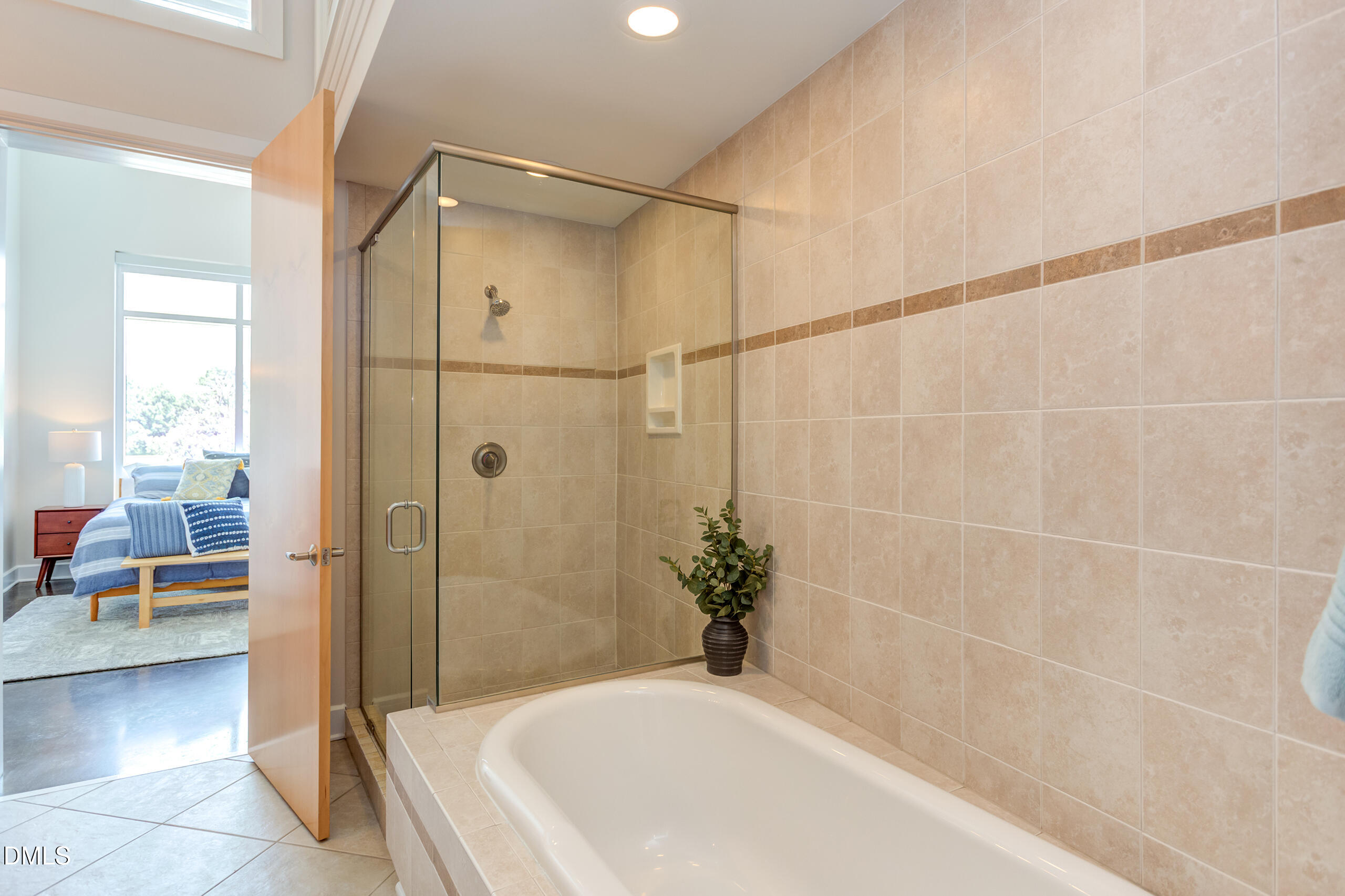 2608 Erwin Road, Unit 417 Durham, NC 27705 - Photo 28 of 50 a bathroom with a bathtub and a shower