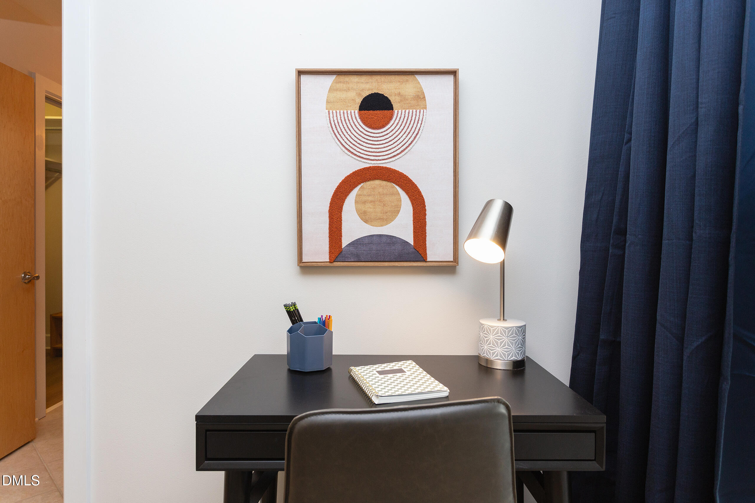 2608 Erwin Road, Unit 417 Durham, NC 27705 - Photo 37 of 50 a view of a workspace with a table and a chair