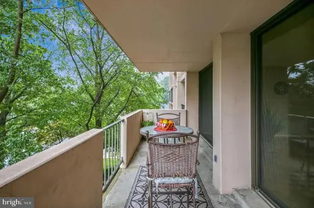 a balcony with outdoor view