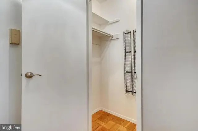 a view of a room with racks on the wall