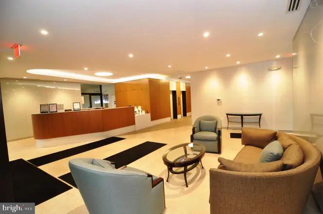 4141 North Henderson Road, Unit 322 Arlington, VA 22203 - Photo 40 of 53 a living room with furniture