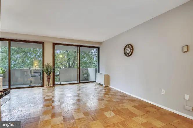 4141 North Henderson Road, Unit 322 Arlington, VA 22203 - Photo 5 of 53 a view of a room with a large window