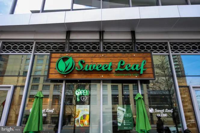 4141 North Henderson Road, Unit 322 Arlington, VA 22203 - Photo 51 of 53 a front view of a building with glass windows and door