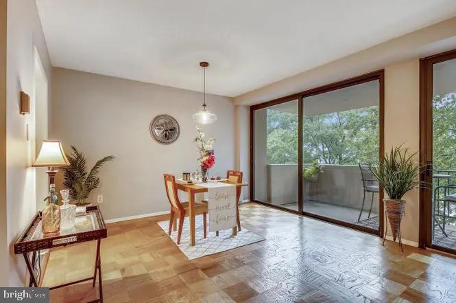 4141 North Henderson Road, Unit 322 Arlington, VA 22203 - Photo 8 of 53 a view of a dining room with furniture window and outside view