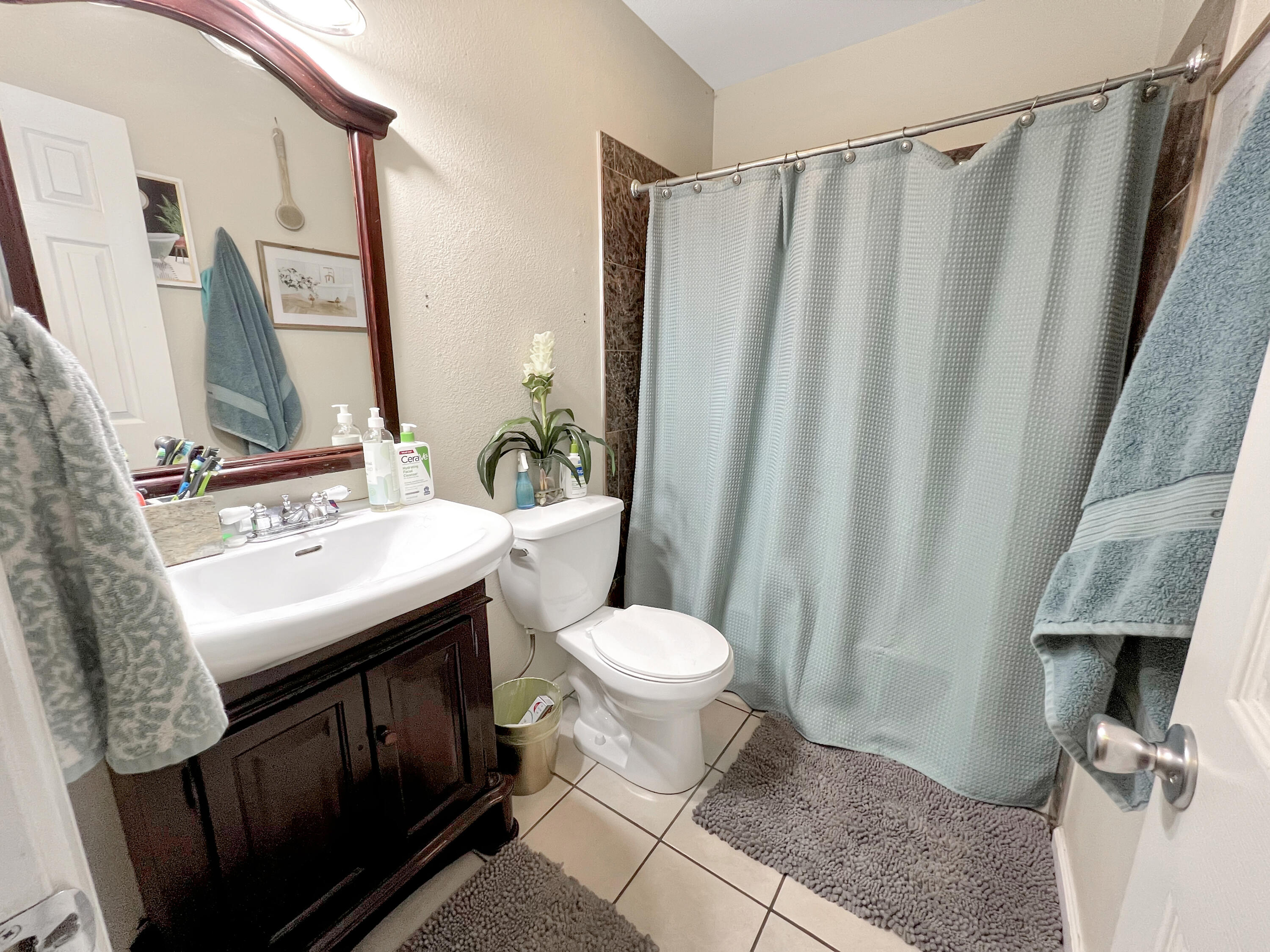 44590 Roundtable Street Indio, CA 92201 - Photo 11 of 16 a bathroom with a sink toilet and shower