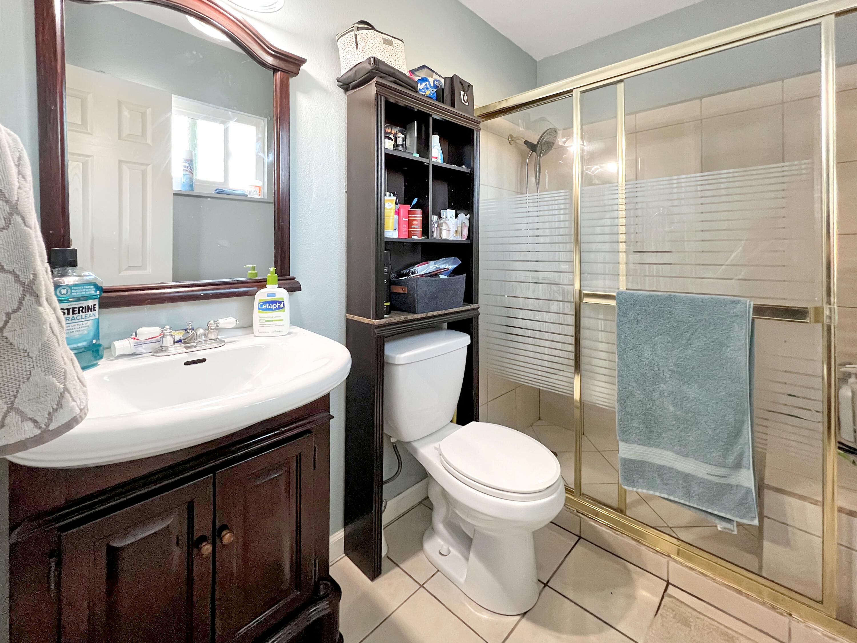 44590 Roundtable Street Indio, CA 92201 - Photo 15 of 16 a bathroom with a sink toilet and shower