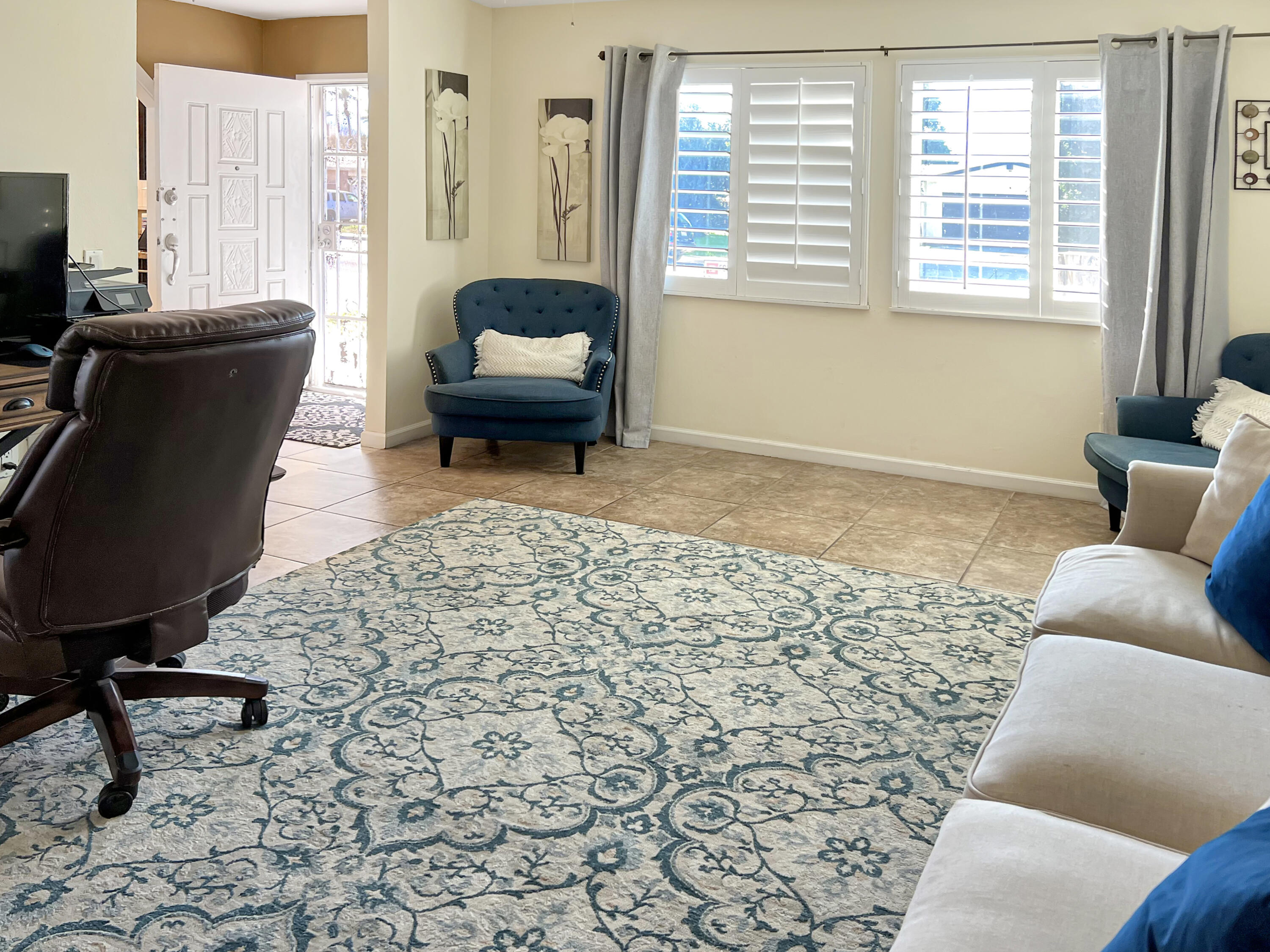 44590 Roundtable Street Indio, CA 92201 - Photo 4 of 16 a living room with furniture and a window