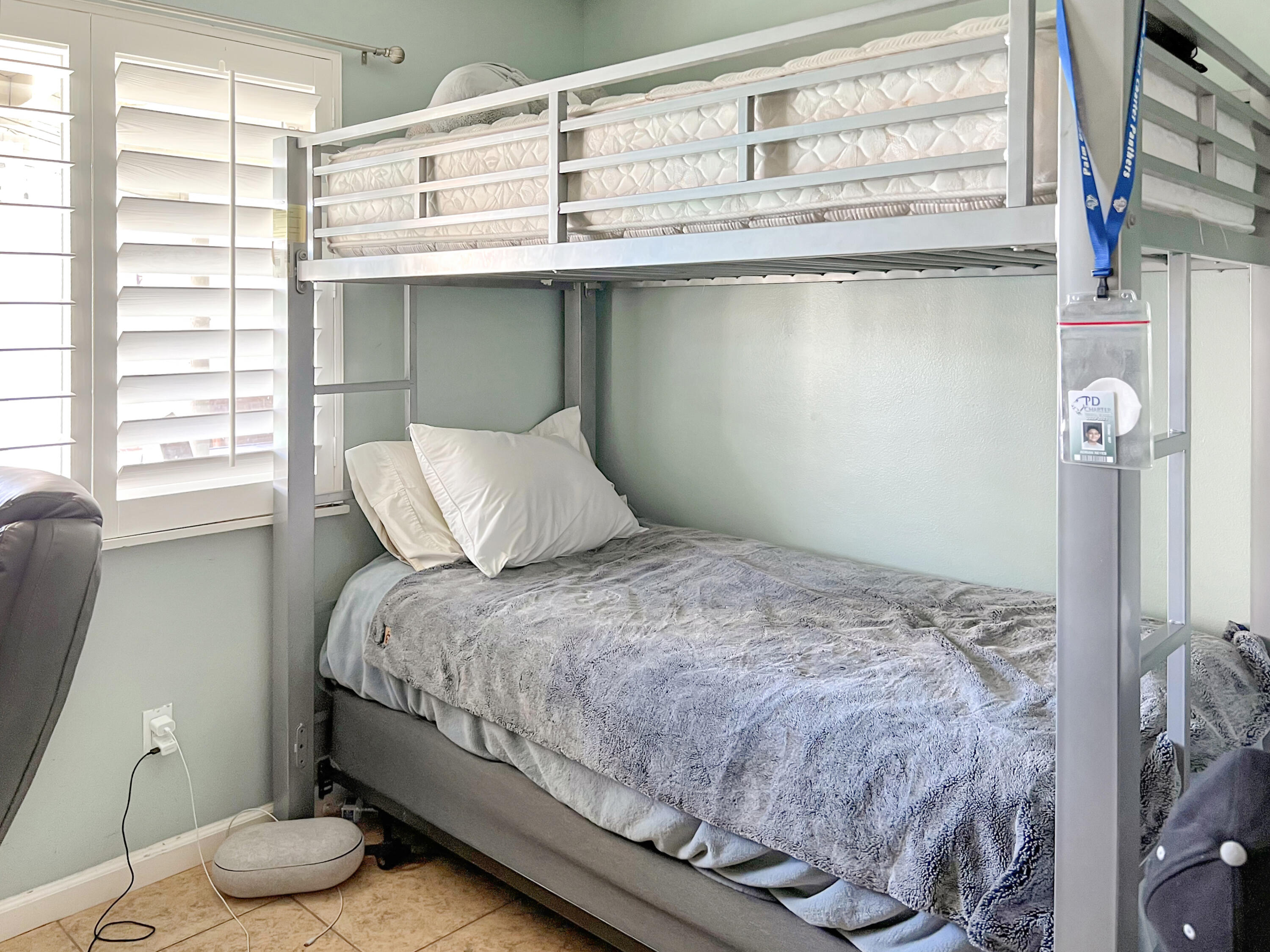 44590 Roundtable Street Indio, CA 92201 - Photo 10 of 16 a bedroom with a bed and a window