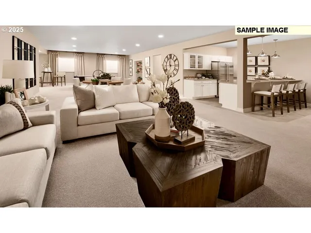 a living room with furniture and white kitchen