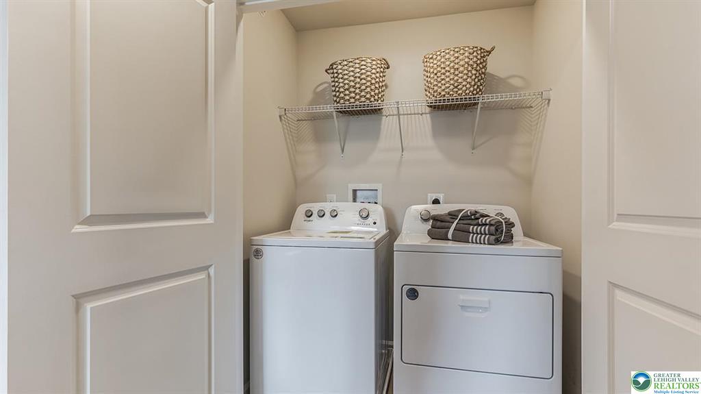 1145 Martin Road Breinigsville, PA 18031 - Photo 18 of 38 A well-organized laundry area offers both convenience and ample storage solutions.