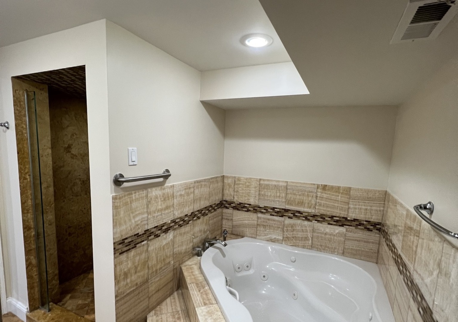 2933 Central Road Glenview, IL 60025 - Photo 29 of 38 a bathroom with a bathtub and shower