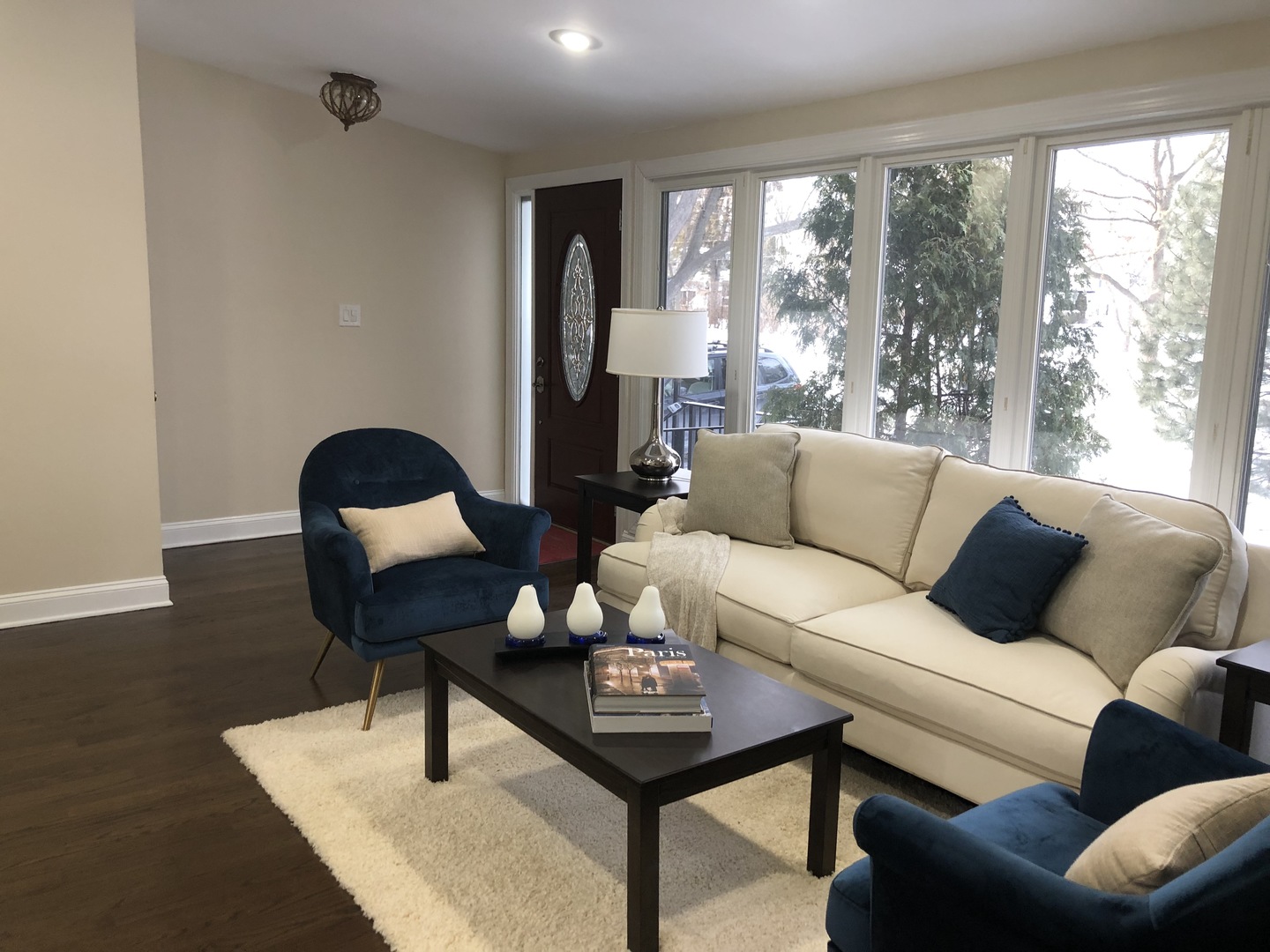 2933 Central Road Glenview, IL 60025 - Photo 5 of 38 a living room with furniture and a large window