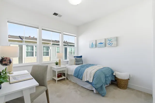 a workspace with furniture and wooden floor