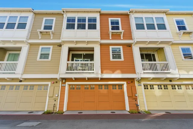 a view of entryway with wooden floor and stairs