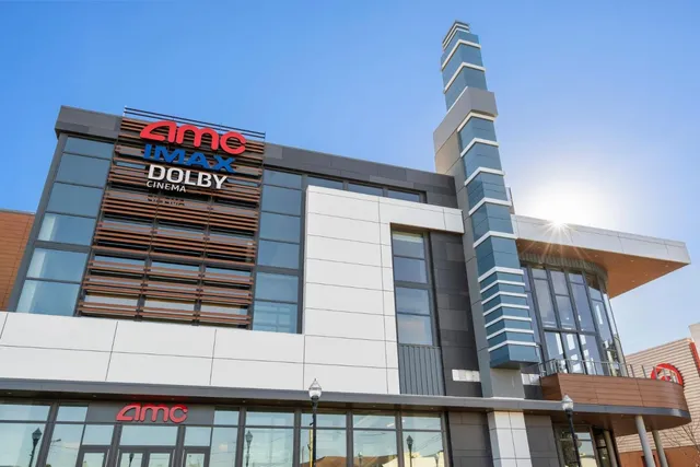 a view of a street with a building in the background