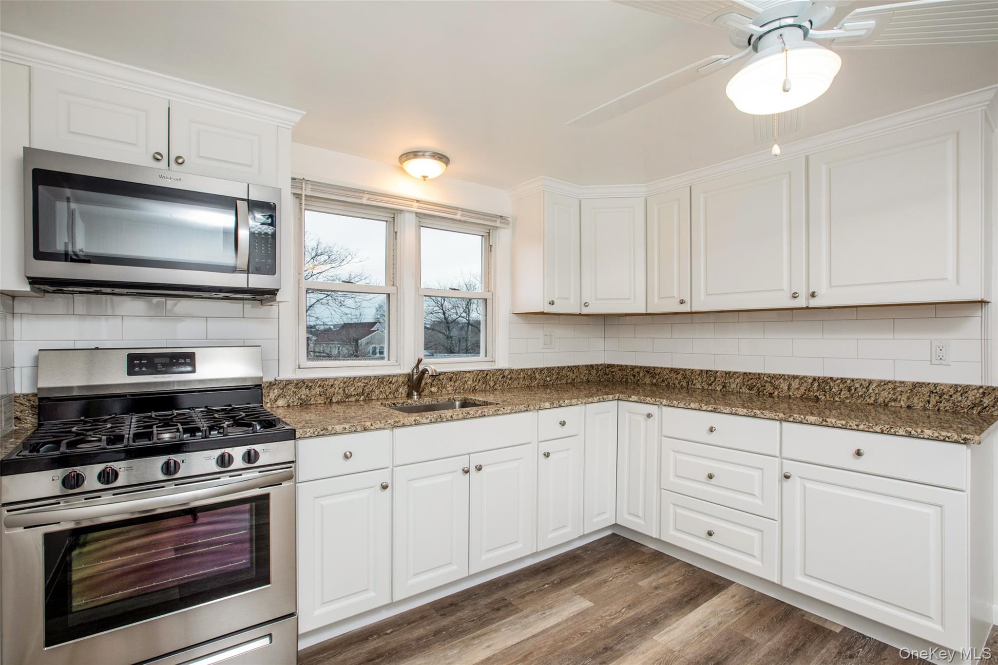 40 Division Street Rye Brook, NY 10573 - Photo 2 of 20 Rise and Shine - Tons of countertop space, cabinets, Microwave, Gas oven, Ceiling Fan