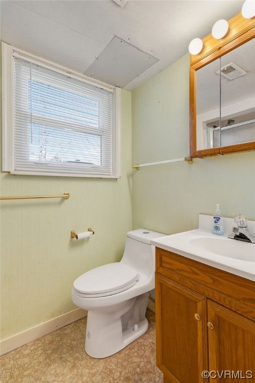 9510 Riddle Road Chesterfield, VA 23832 - Photo 16 of 20 a bathroom with a granite countertop toilet sink and mirror