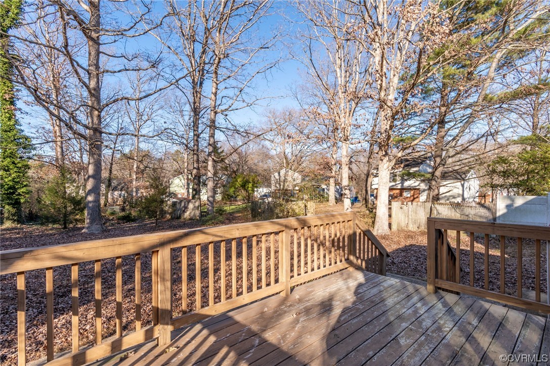 9510 Riddle Road Chesterfield, VA 23832 - Photo 18 of 20 a view of a wooden deck with trees with wooden fence