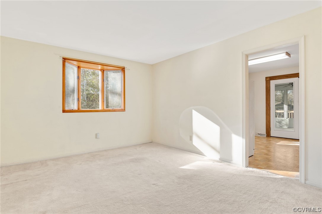 9510 Riddle Road Chesterfield, VA 23832 - Photo 2 of 20 a view of an empty room with a window