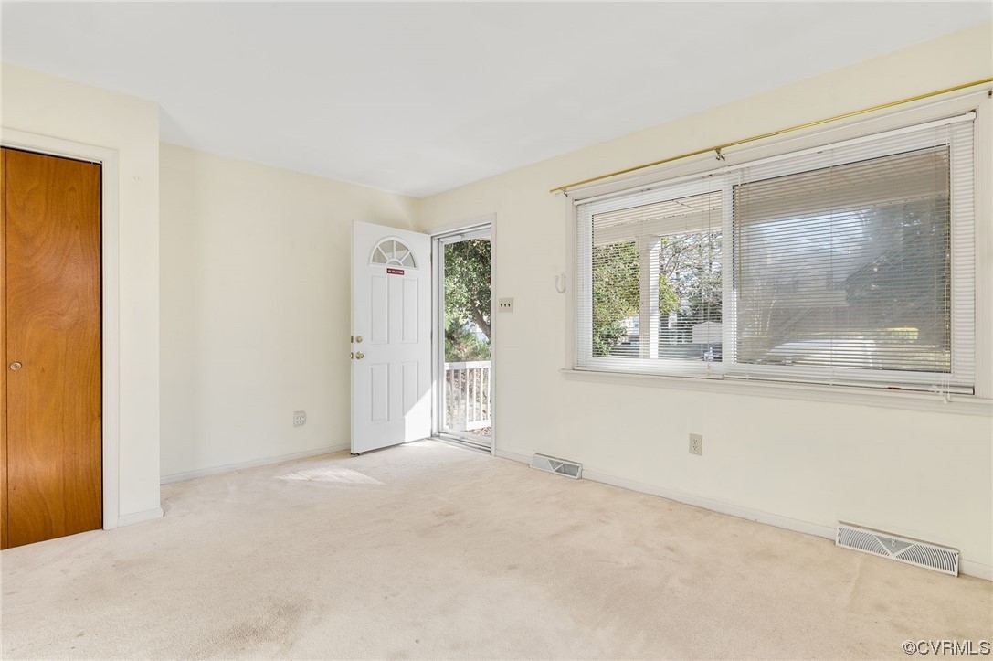 9510 Riddle Road Chesterfield, VA 23832 - Photo 3 of 20 an empty room with windows