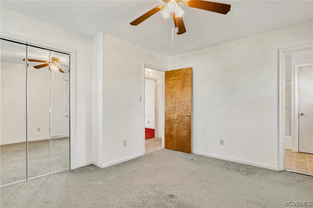 9510 Riddle Road Chesterfield, VA 23832 - Photo 10 of 20 an empty room with closet and a chandelier fan