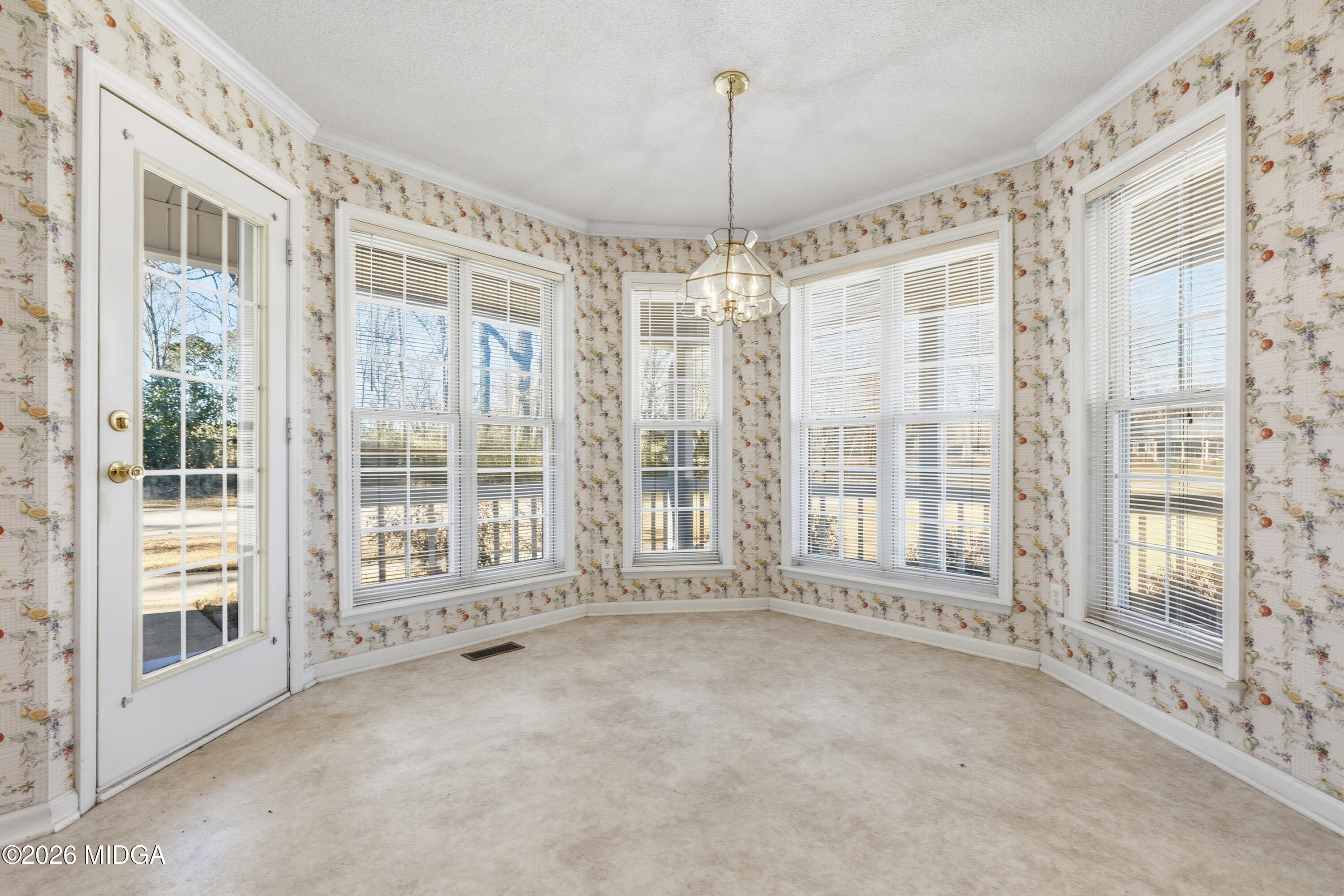8278 Lower Thomaston Road Macon, GA 31220 - Photo 11 of 59 a view of an empty room with windows