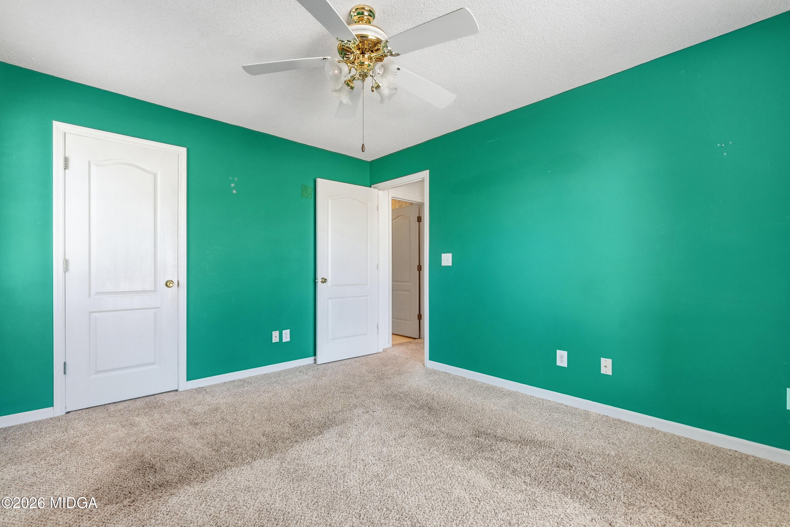 8278 Lower Thomaston Road Macon, GA 31220 - Photo 23 of 59 an empty room with a window and a fan