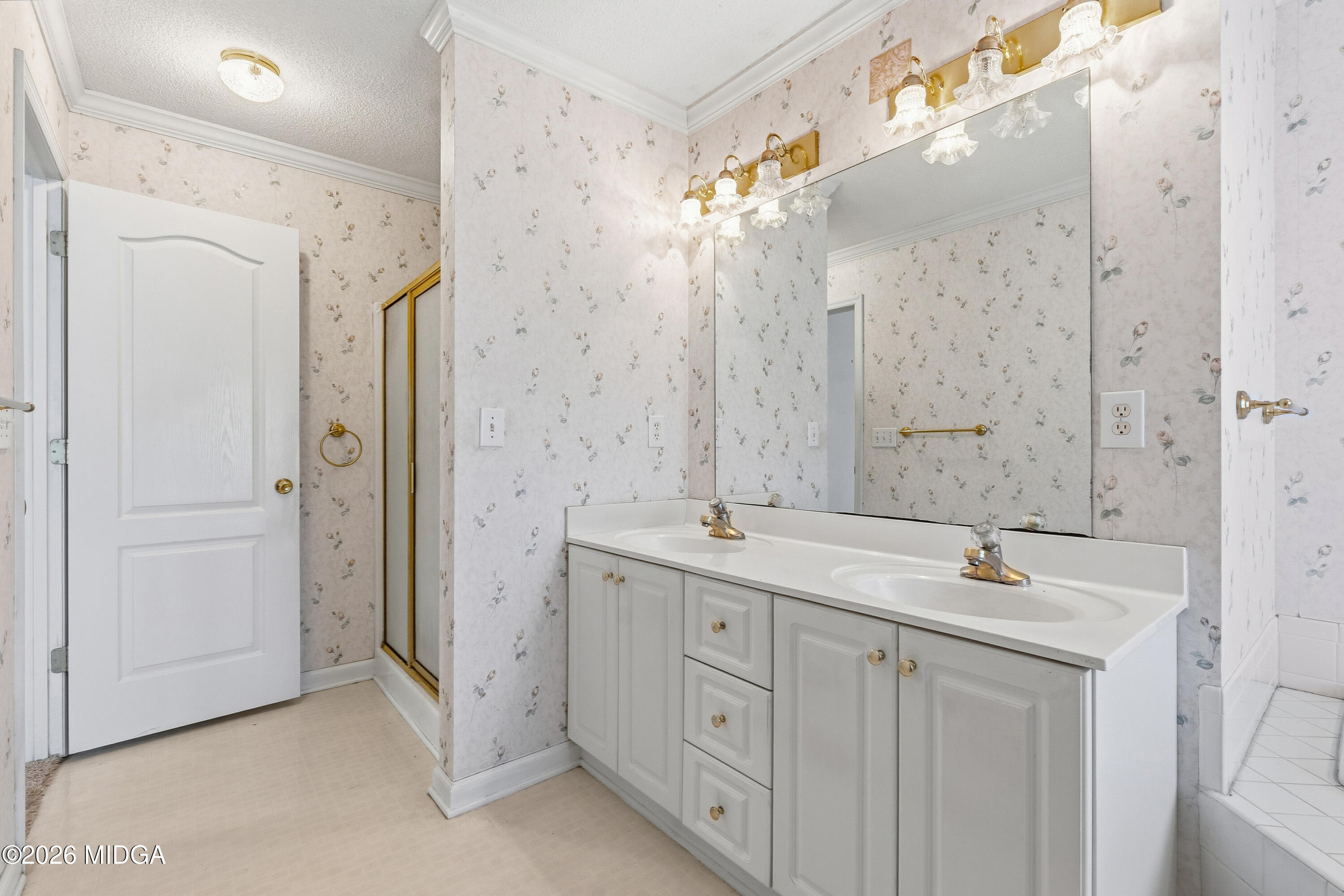 8278 Lower Thomaston Road Macon, GA 31220 - Photo 26 of 59 a spacious bathroom with a granite countertop sink mirror and double