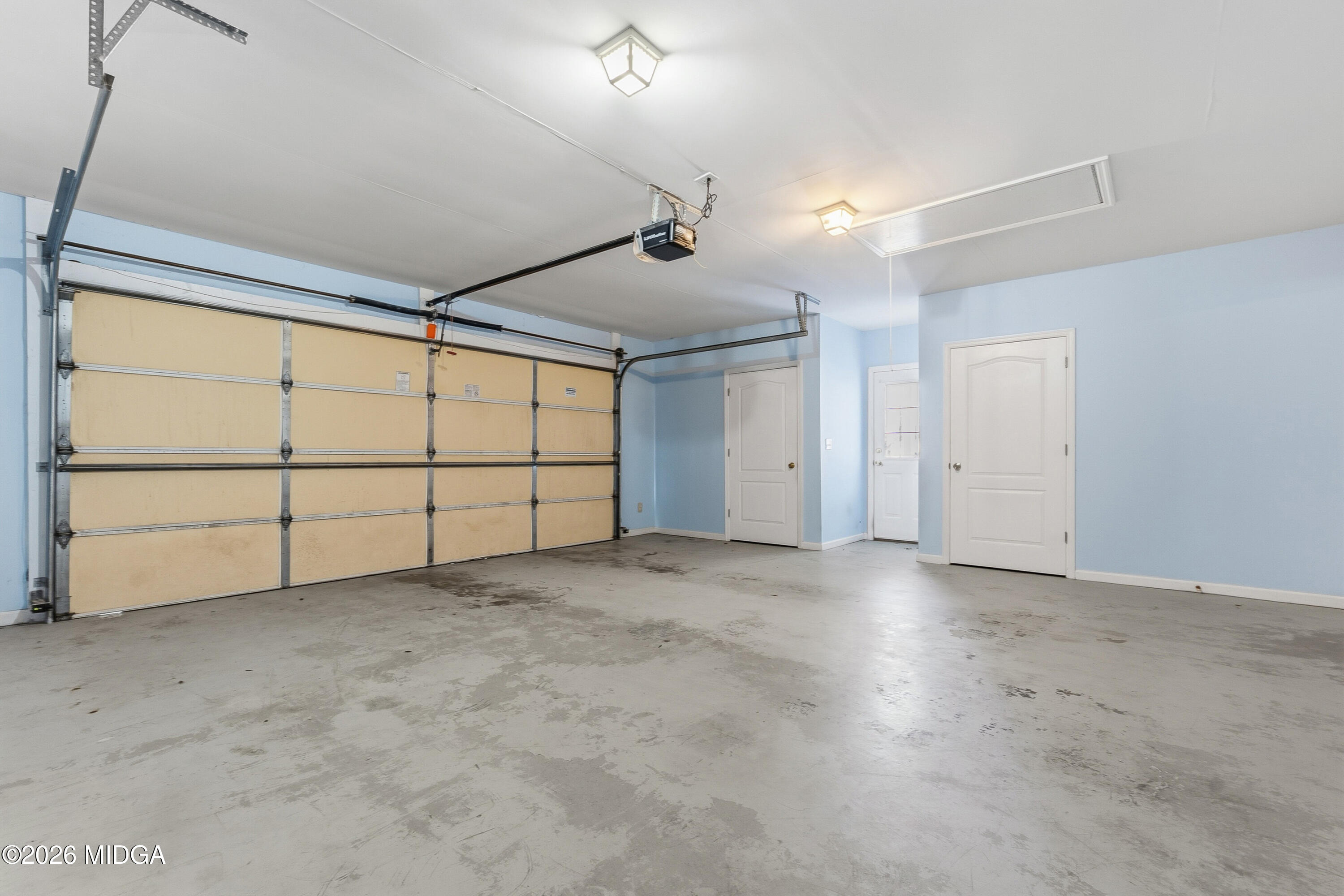 8278 Lower Thomaston Road Macon, GA 31220 - Photo 36 of 59 an empty room with windows and ceiling fan
