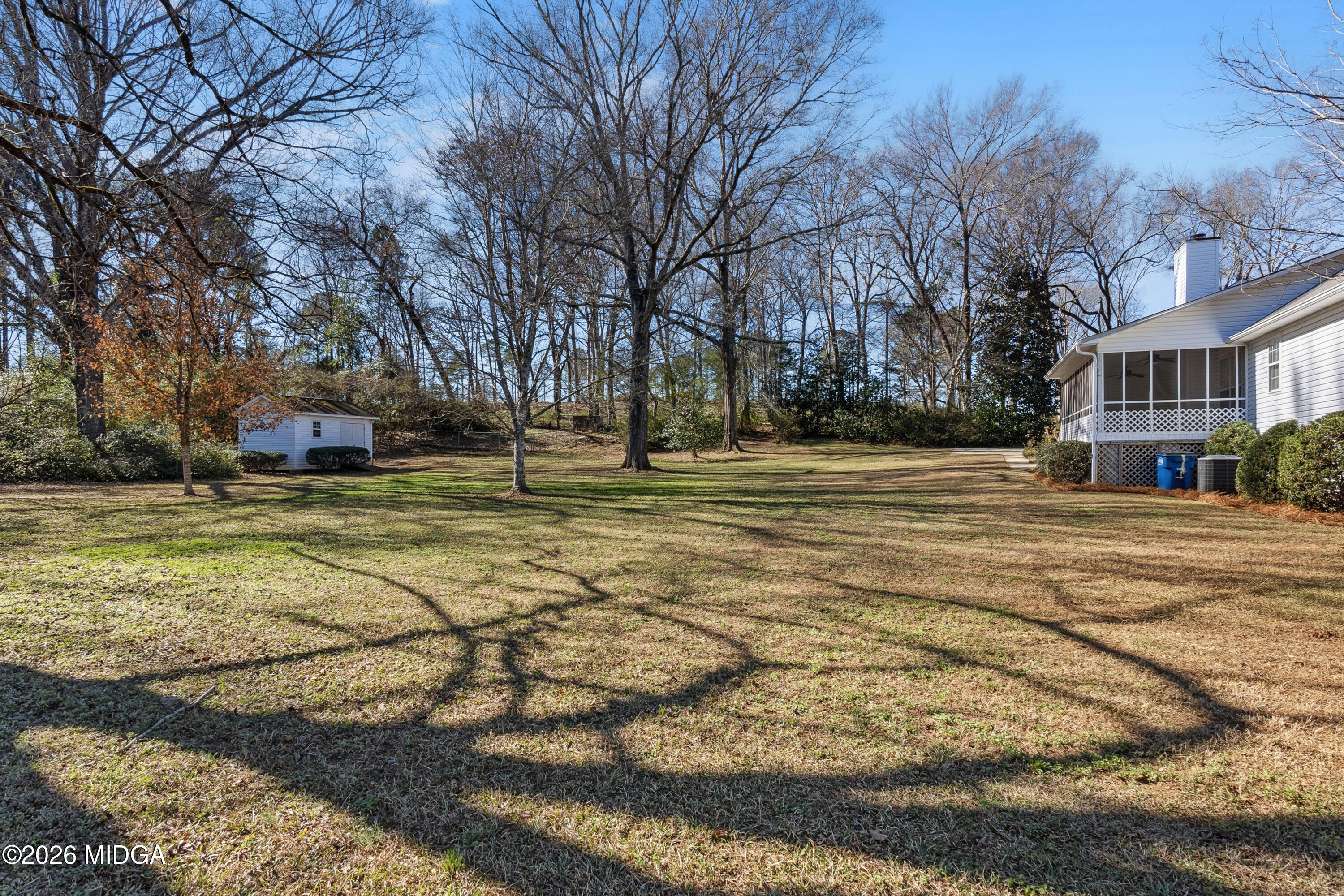 8278 Lower Thomaston Road Macon, GA 31220 - Photo 42 of 59 a swimming pool with trees in front of it