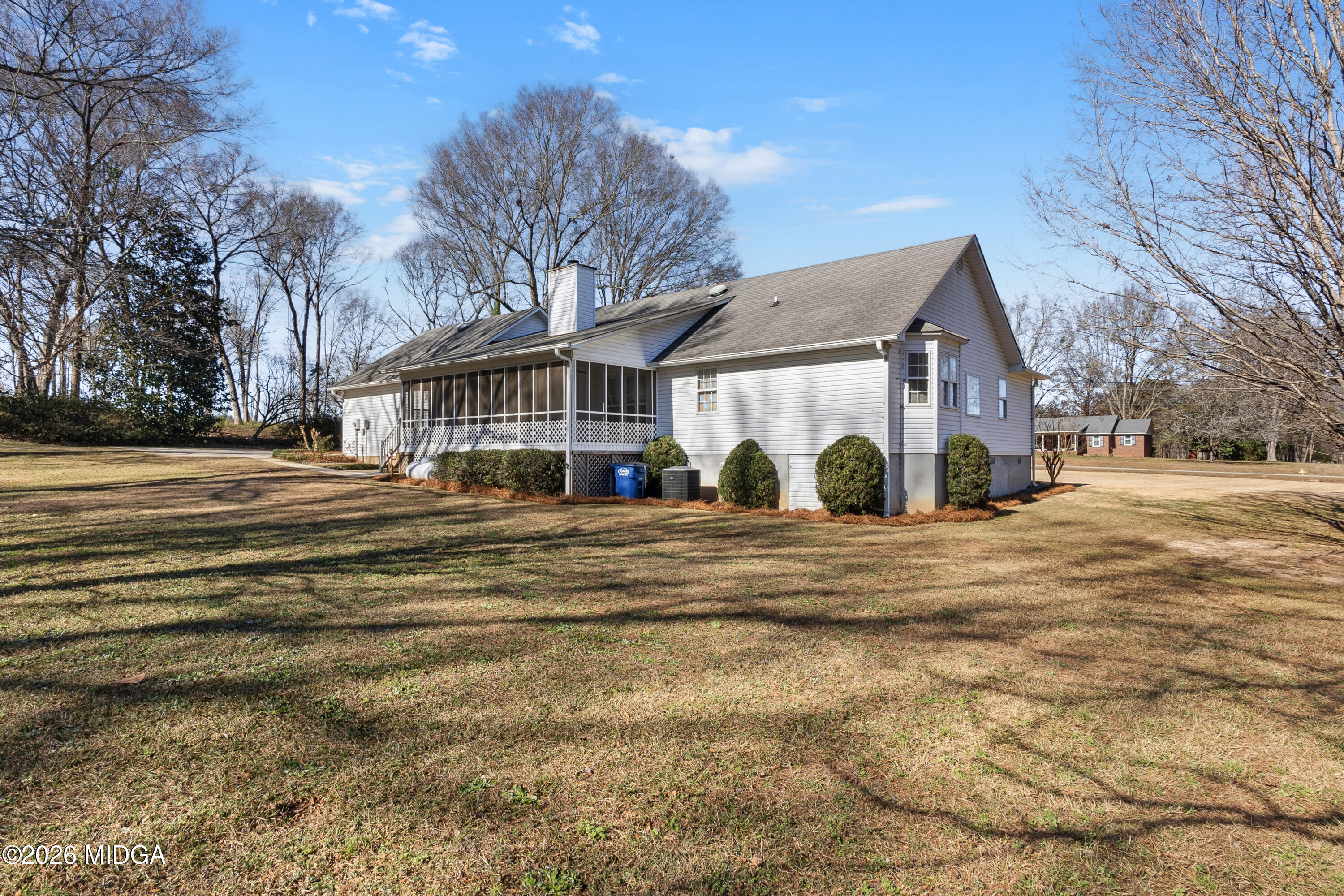 8278 Lower Thomaston Road Macon, GA 31220 - Photo 43 of 59 a view of a house with a yard