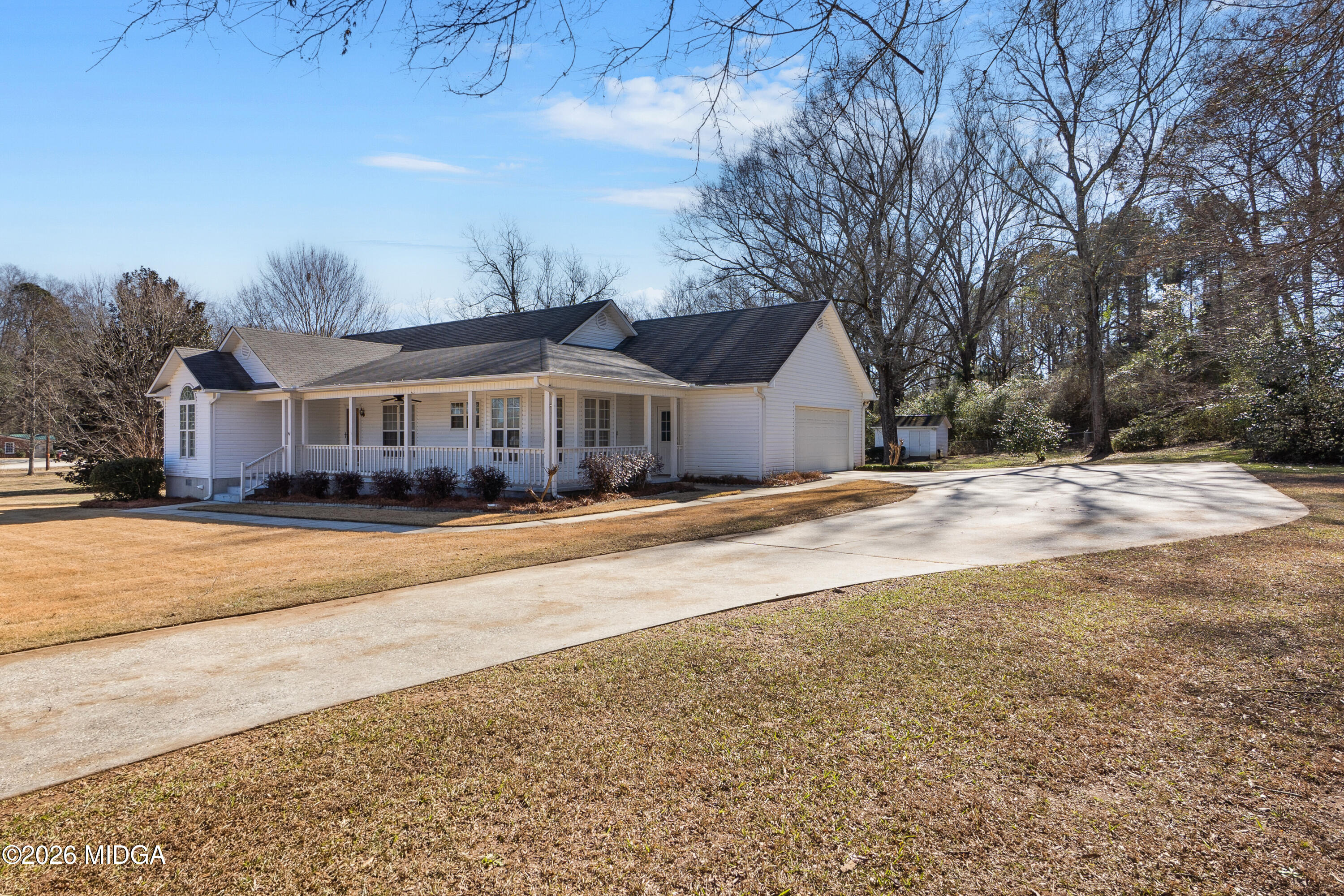 8278 Lower Thomaston Road Macon, GA 31220 - Photo 55 of 59 a view of house with yard and trees in the background