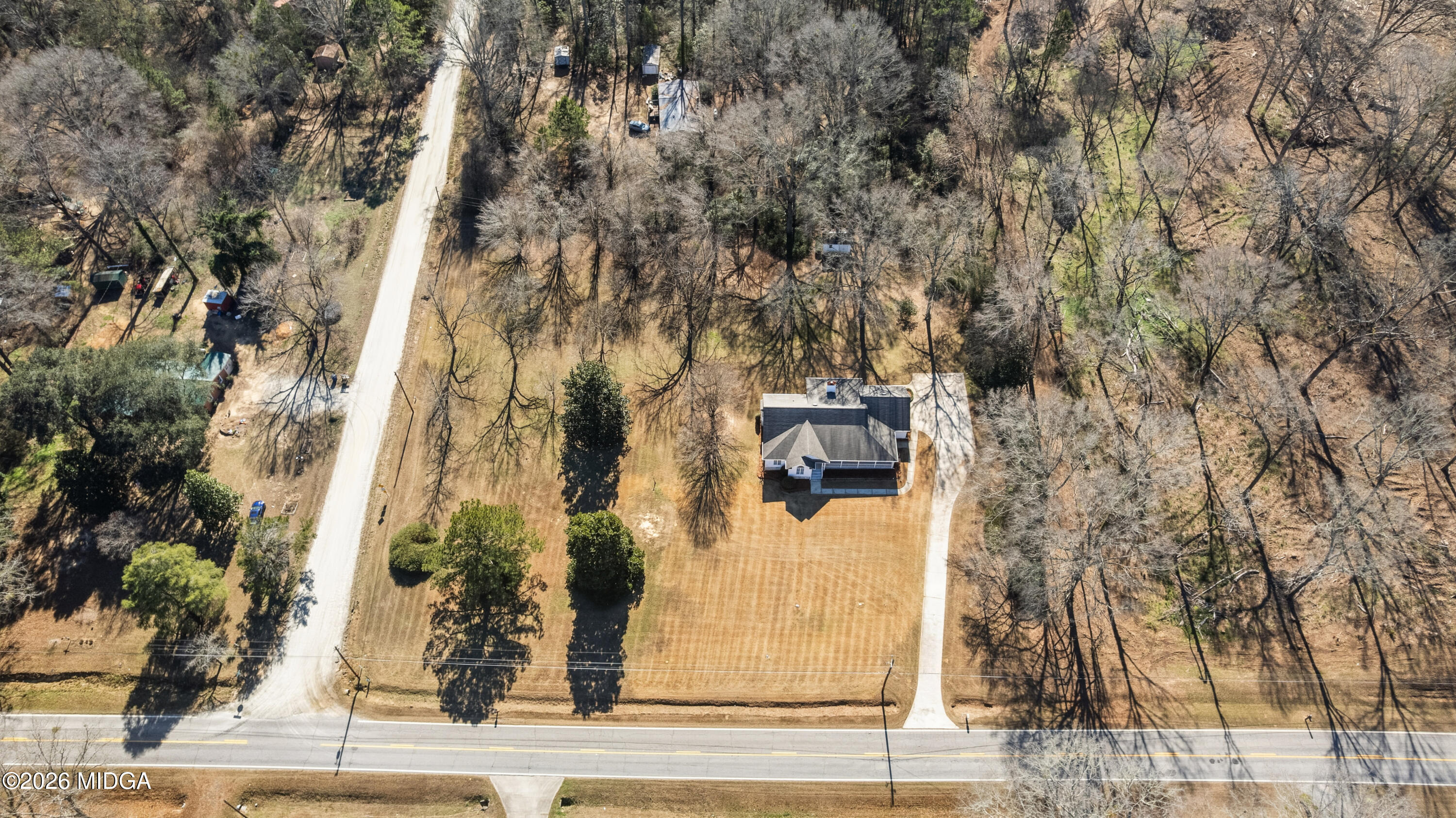 8278 Lower Thomaston Road Macon, GA 31220 - Photo 59 of 59 front view of a house with a trees