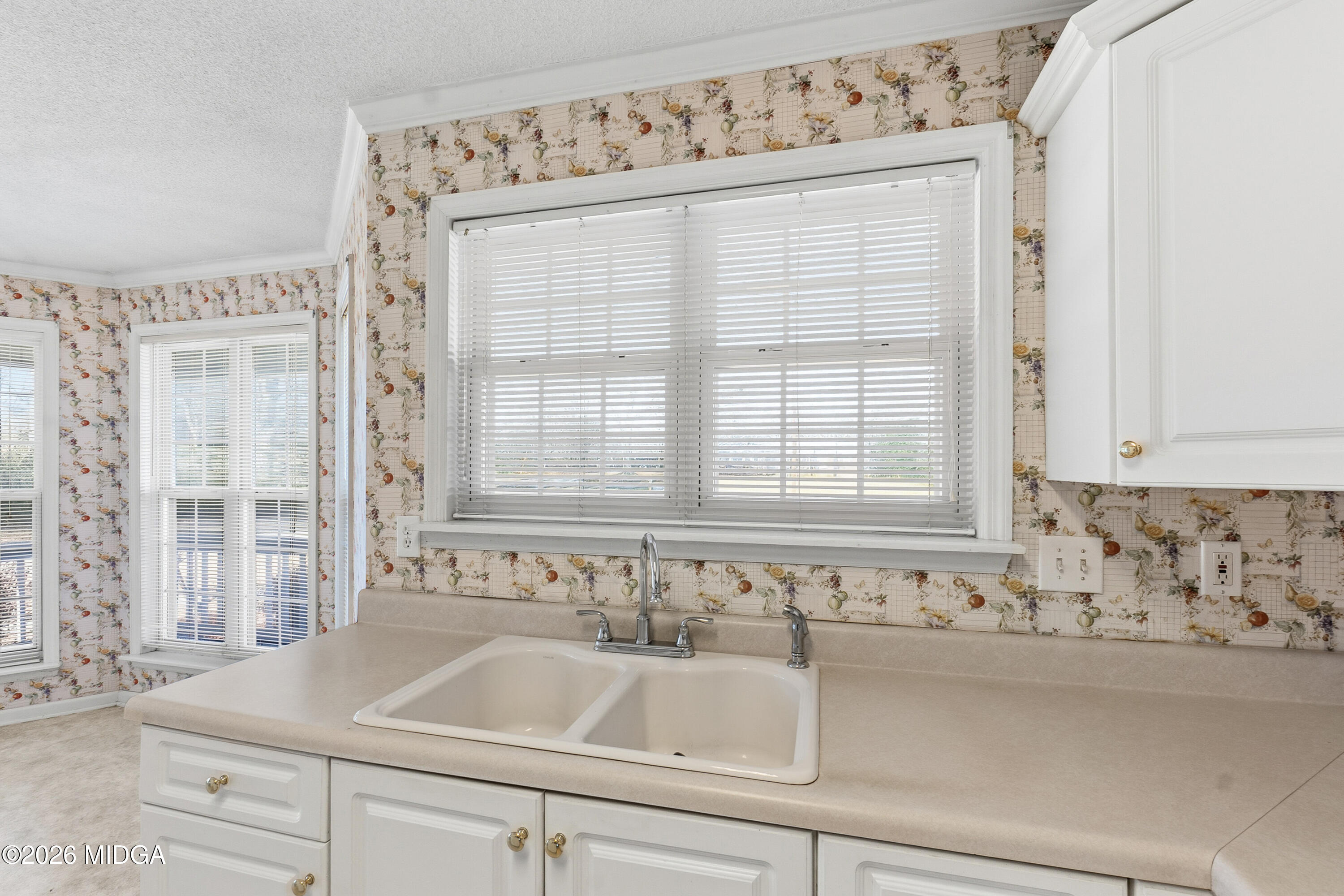 8278 Lower Thomaston Road Macon, GA 31220 - Photo 6 of 59 a bathroom with a sink and a bathtub