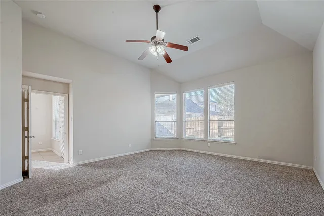 a spacious bathroom with a double vanity sink mirror and shower