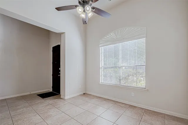 a living room with furniture fireplace and flat screen tv