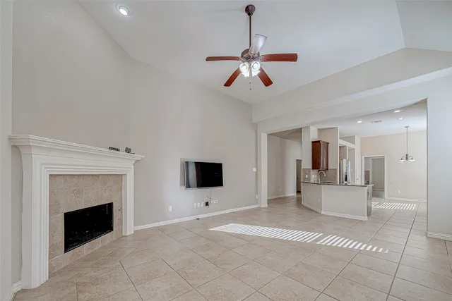 a kitchen with a sink and a refrigerator
