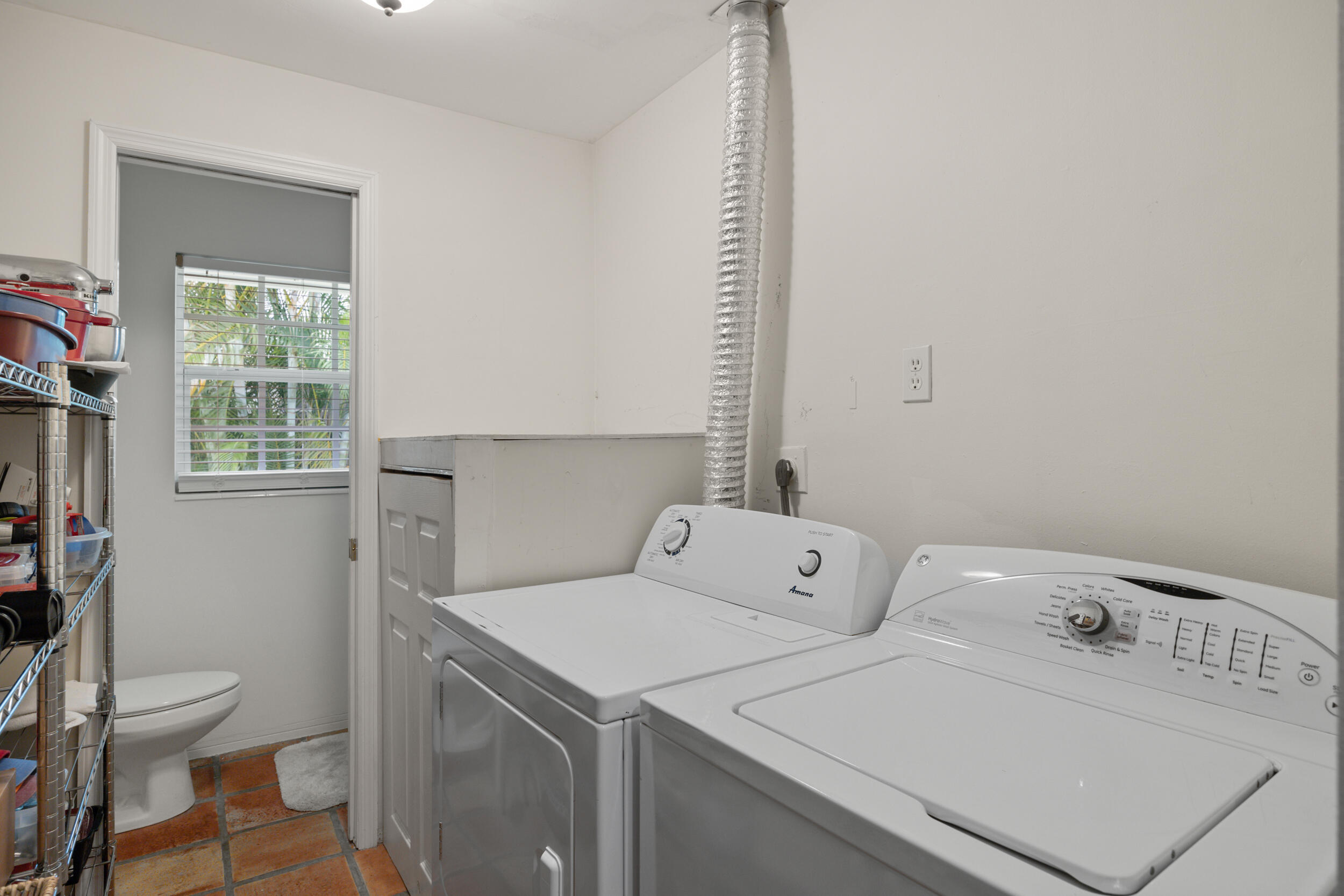 104 Fairview West Tequesta, FL 33469 - Photo 25 of 32 a utility room with dryer and washer