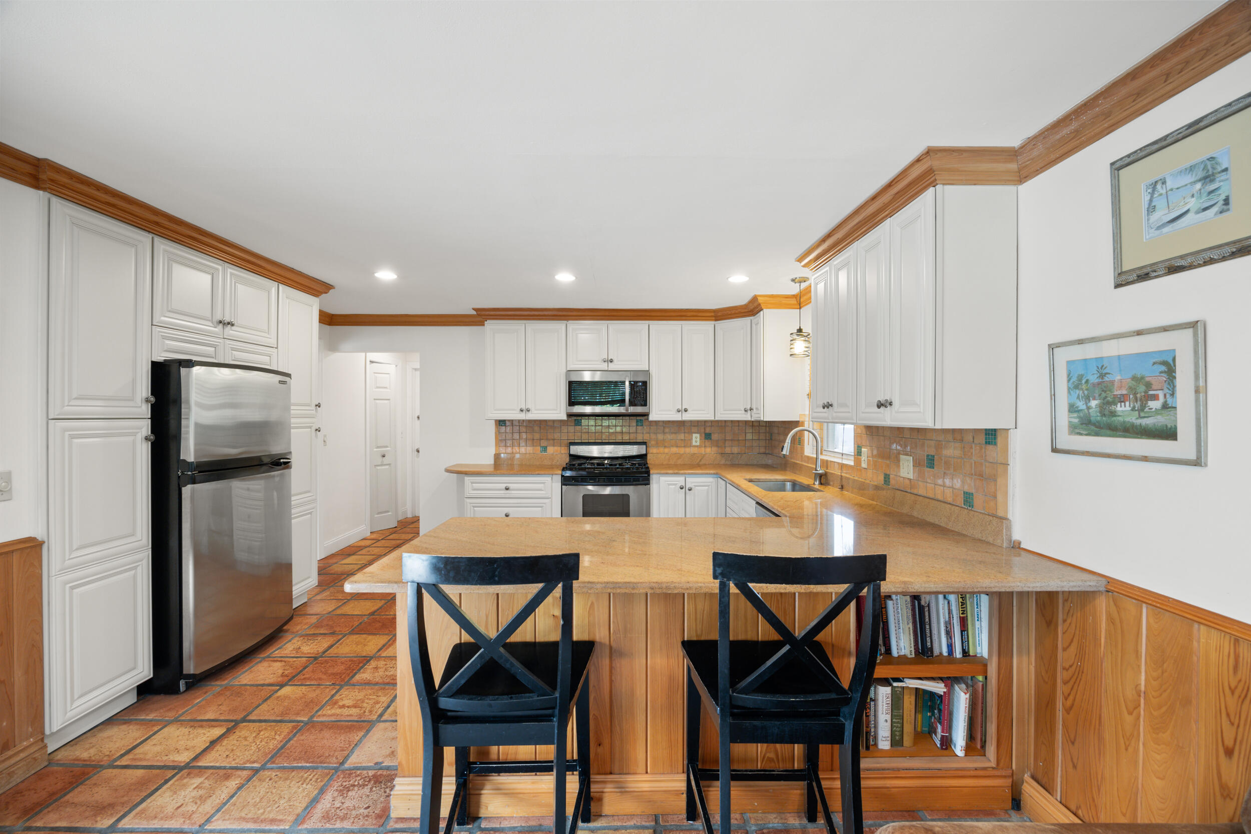 104 Fairview West Tequesta, FL 33469 - Photo 10 of 32 a view of a dining room with furniture